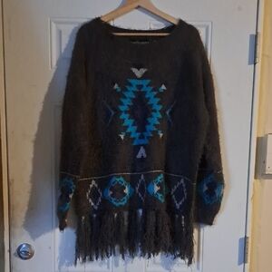 Chic Geometric Patterned Sweater with Fringe Hem